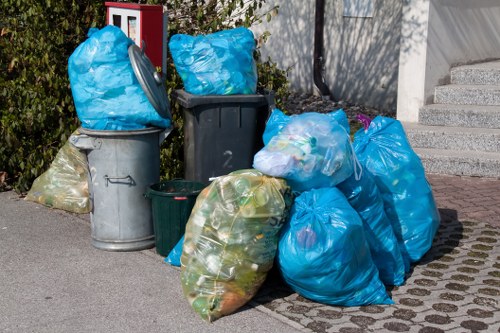 Waste management professionals at work in Abbey Wood